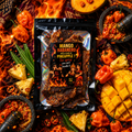 Mango Habanero Pineapple Beef Jerky holographic bag surrounded by fresh mango, pineapple, and habanero peppers